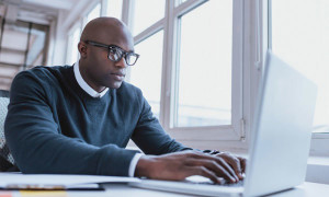 Man using laptop computer