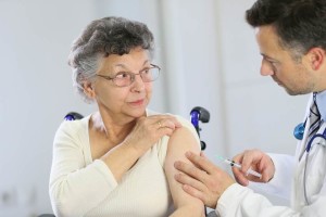 Physician treats elderly patient
