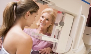 woman getting mammogram