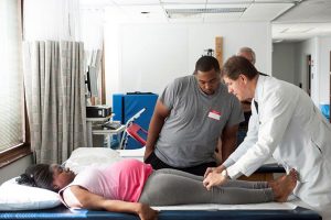 Doctor working with patients